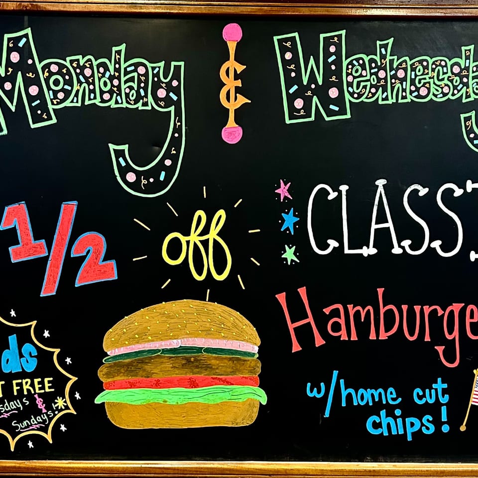 Monday and Wednesday special: half off classic hamburger with home cut chips. Kids eat free Tuesday and Sunday.